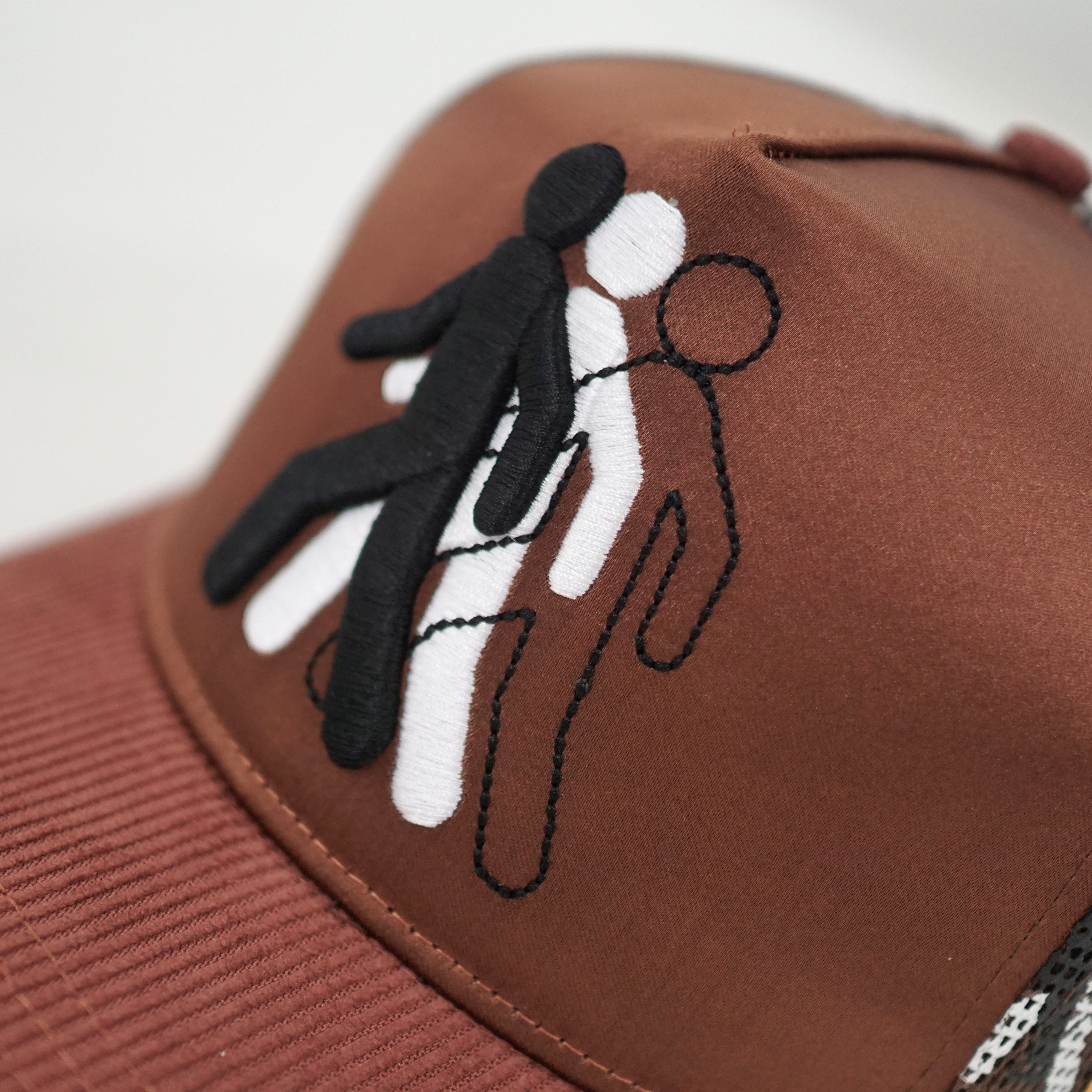 NWM: Rouge Runner Man Trucker Brown